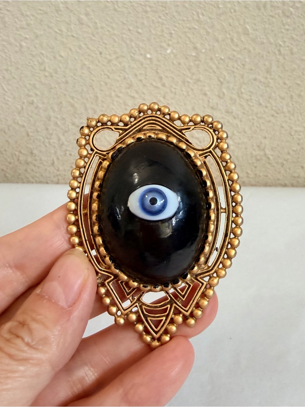 Gold-Tone Evil Eye Statement Brooch with Black Cabochon